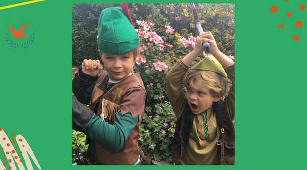 two boys dressed up as Robin Hood with tea Children's Mental Health Week